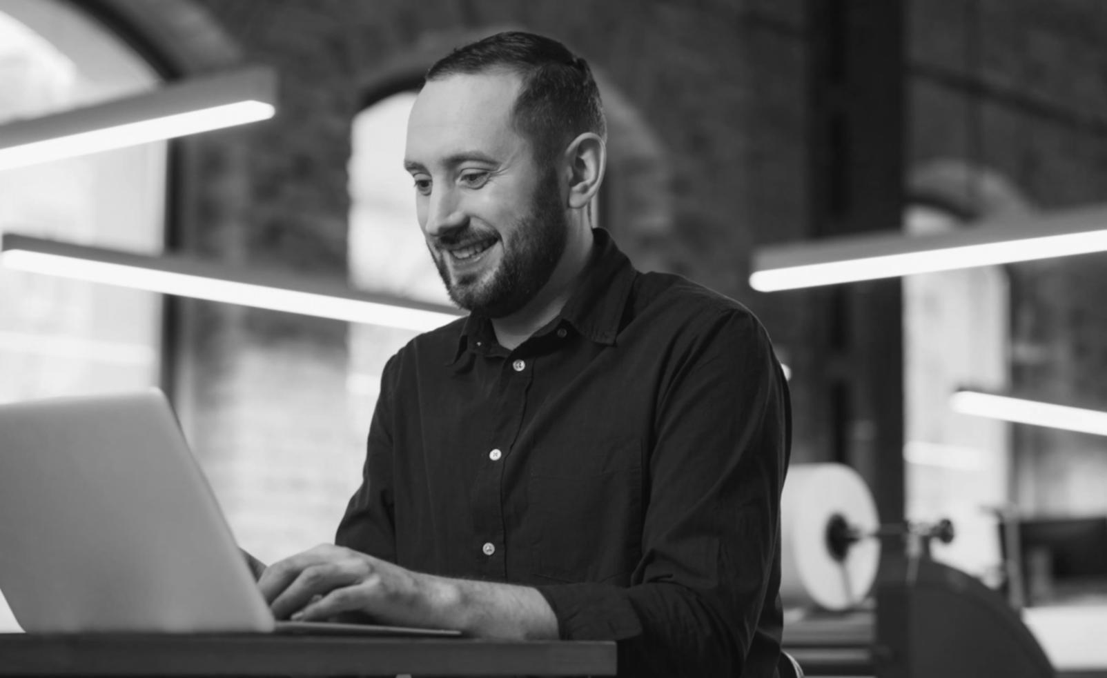 Professional reviewing detailed financial reports and trend analysis